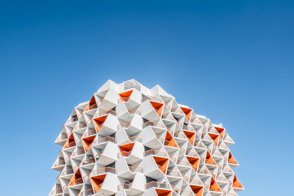 Luxury apartment complex exterior design in Nashik with landscaping and modern amenities